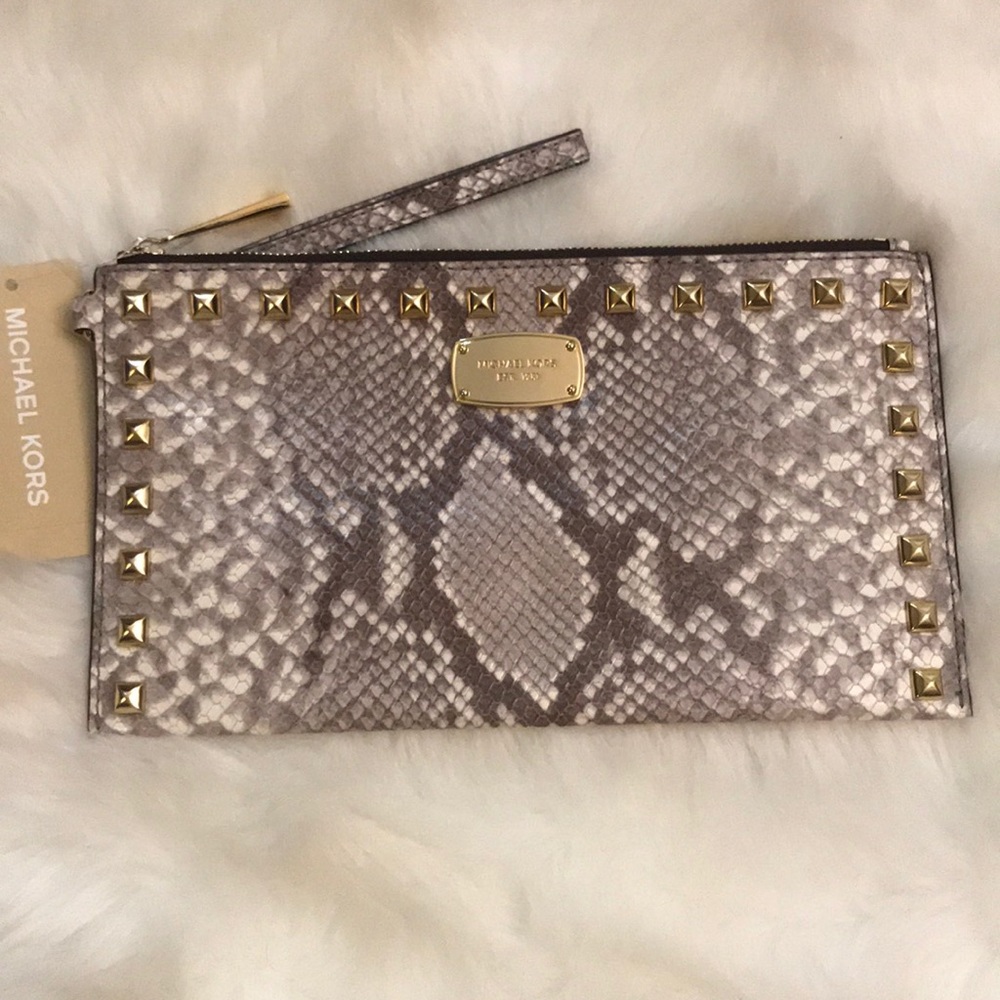 MK “EMBOSSED STUDDED ZIP CLUTCH” WRISTLET